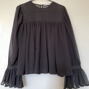 Ruffled black blouse